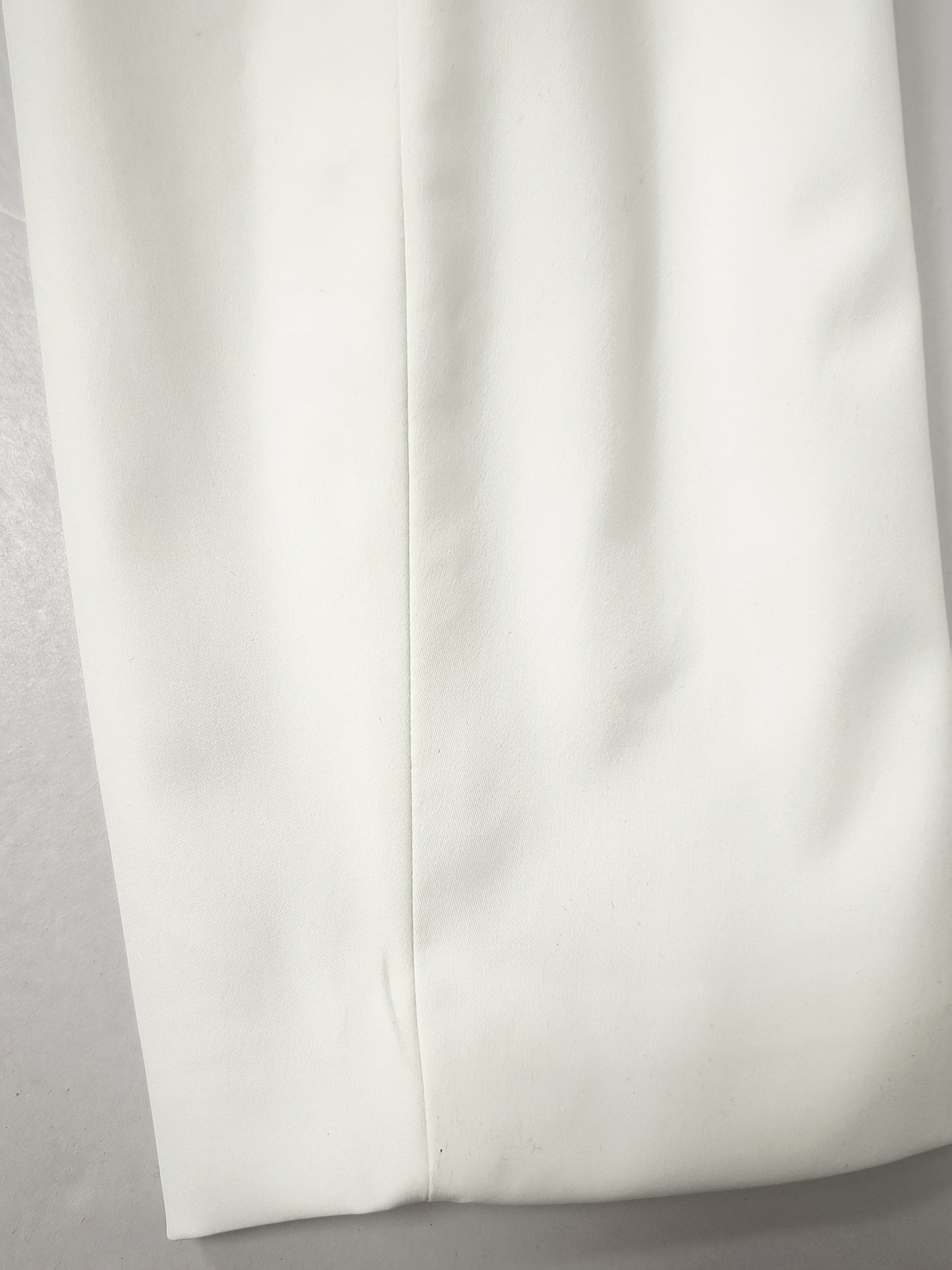 Women'S Half-Length Skirt Suit with a Fitted White Blazer And a Short Skirt, Featuring a Cinched Waist, Perfect for Spring And Summer Office Wear.